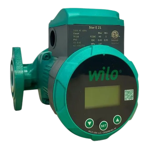 A green Wilo Star E 21 circulator pump with a digital display and adjustment buttons on a circular front panel.